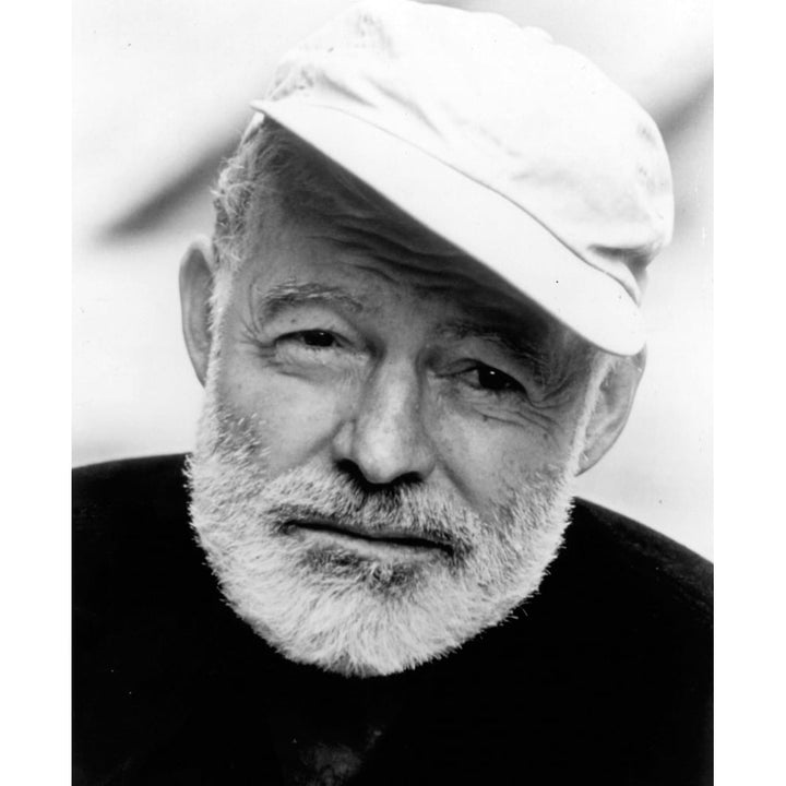 Ernest Hemingway wearing a baseball cap Photo Print Image 1