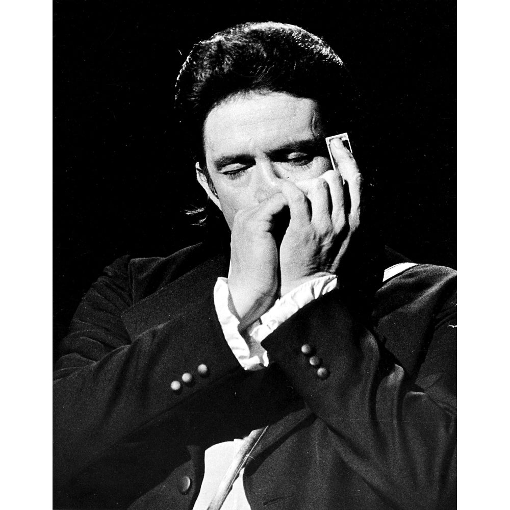 Johnny Cash playing a harmonica Photo Print Image 1