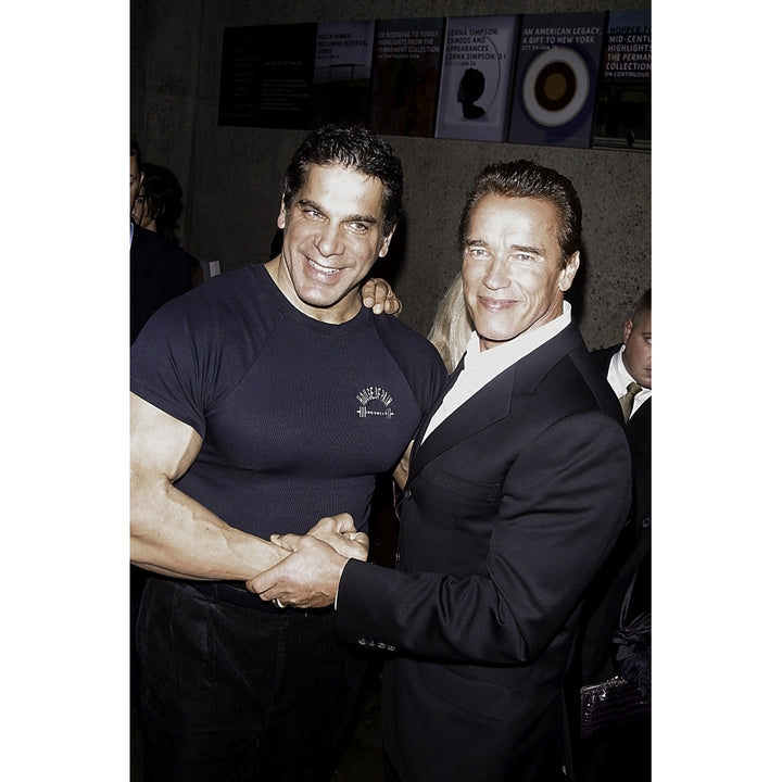 Arnold Schwarzenegger and Lou Ferrigno shaking hands at the 25th Anniversary of Pumping Iron event Photo Print Image 2