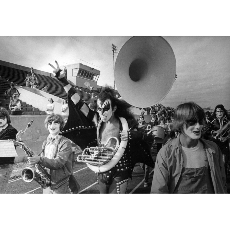 Gene Simmons playing a French horn Photo Print Image 1