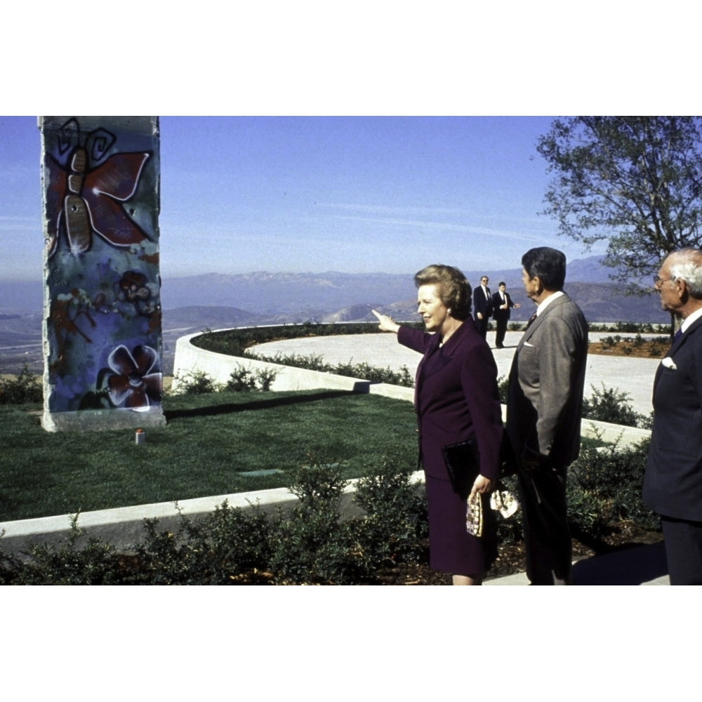 Ronald Reagan Margaret Thatcher and Denis Thatcher being presented with a piece of the Berlin Wall Photo Print Image 1