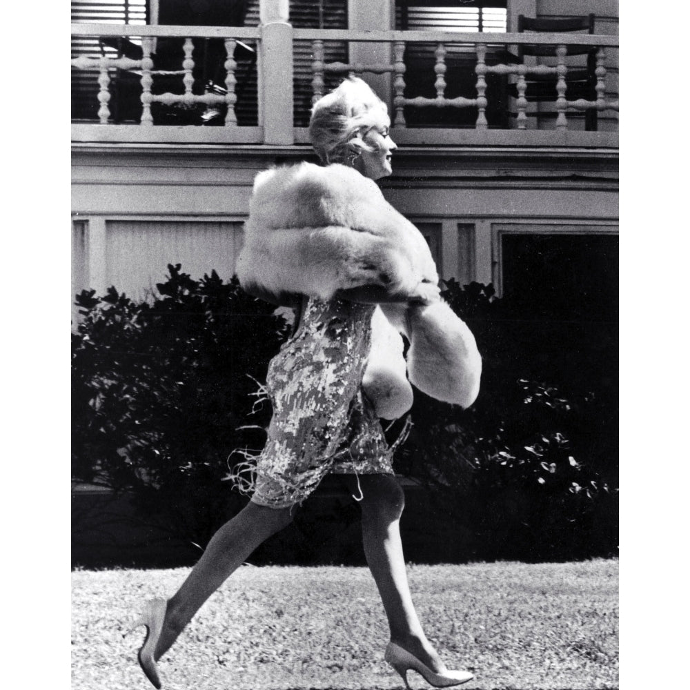 Marilyn Monroe walking across a lawn Photo Print Image 2