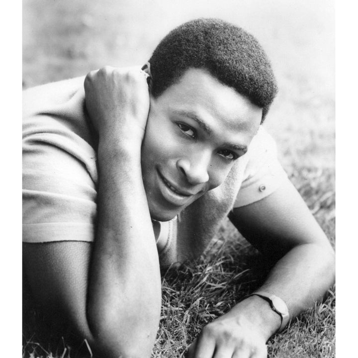 A Marvin Gaye lying outdoors Photo Print Image 1