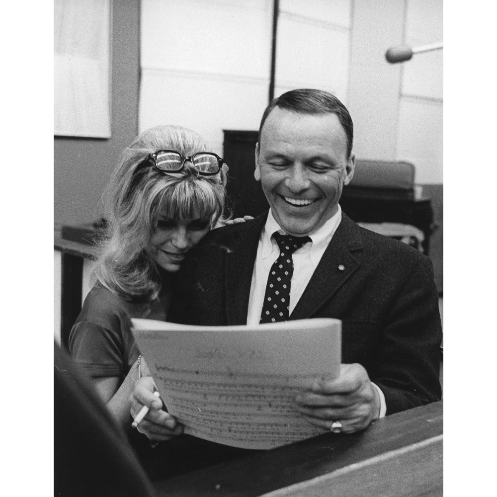 Nancy and Frank Sinatra smiling in a studio Photo Print Image 2