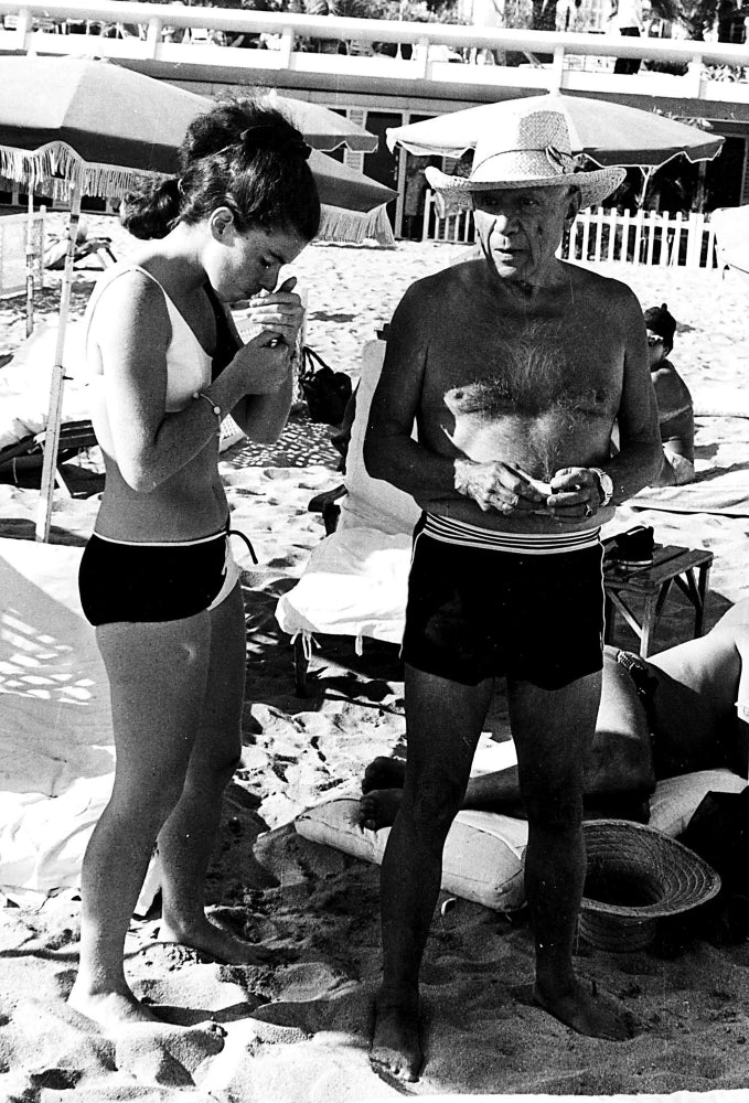 Pablo Picasso and Jacqueline Roque at the beach Photo Print Image 1