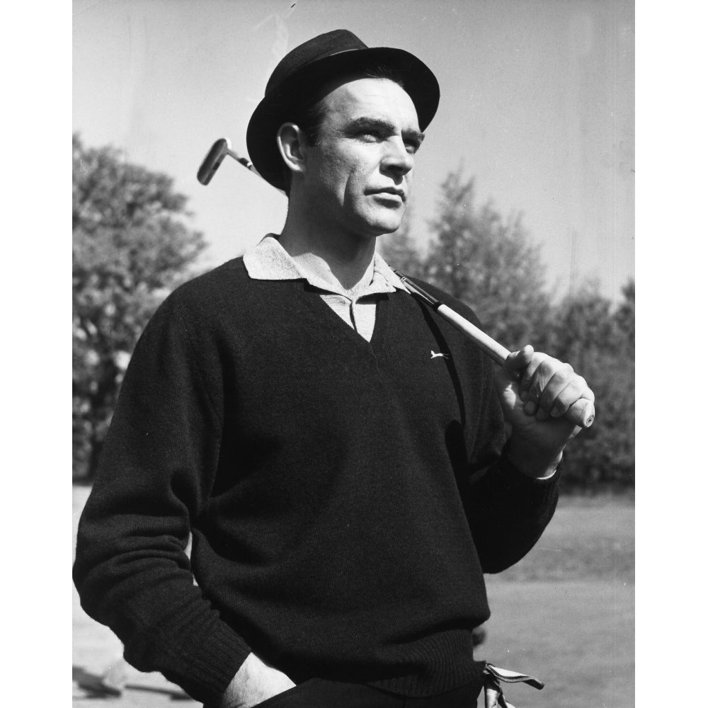 Film still of Sean Connery holding a golf club in Goldfinger Photo Print Image 2