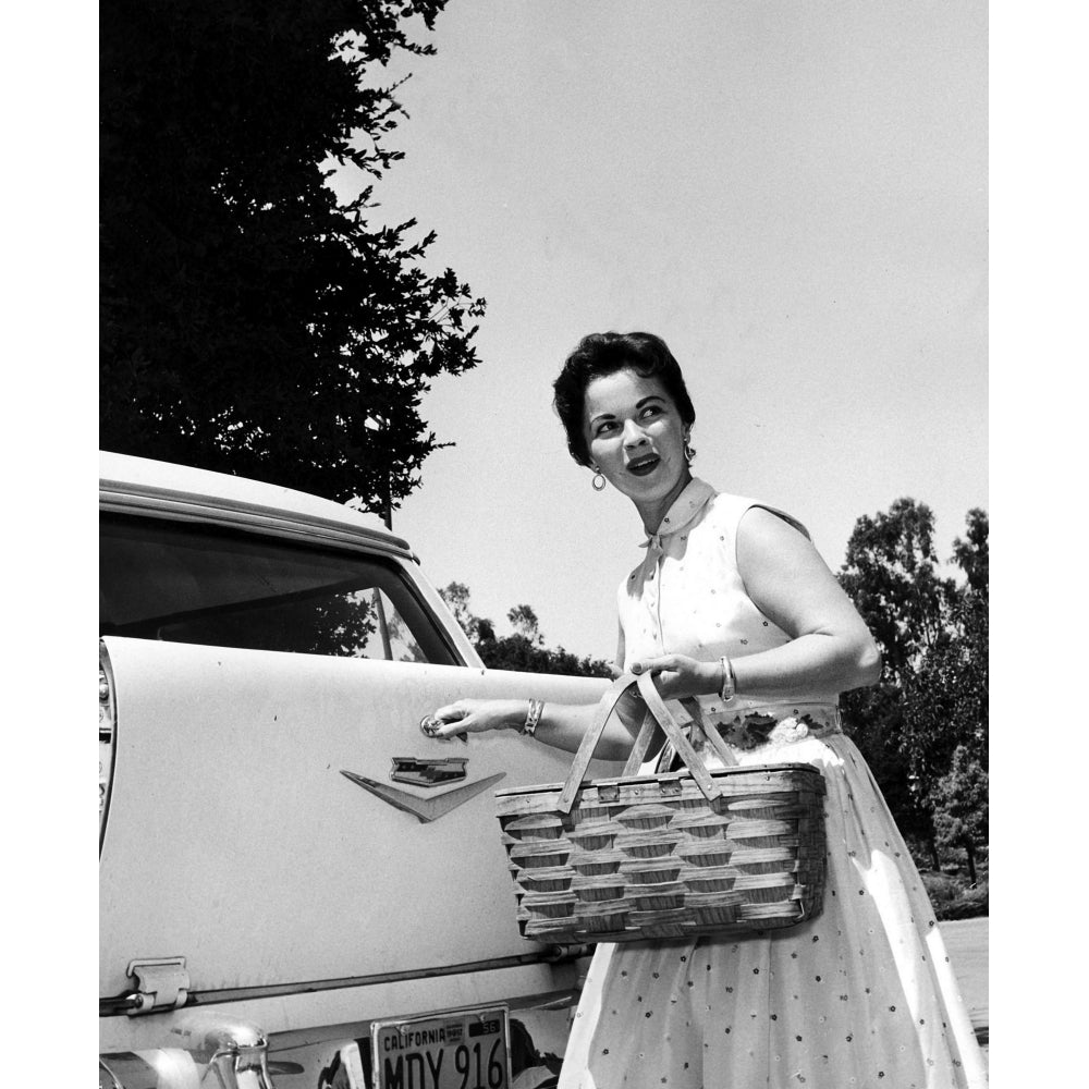 Shirley Temple holding a picnic basket Photo Print Image 2