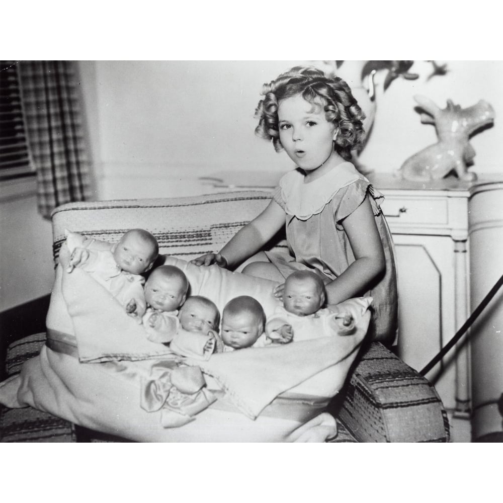 Shirley Temple playing with baby dolls Photo Print Image 1