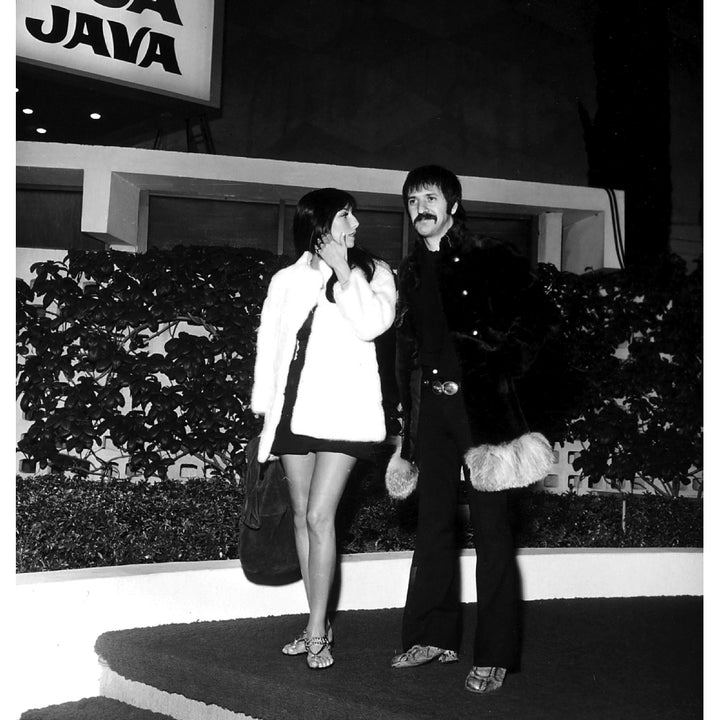 Sonny And Cher standing outside a hotel Photo Print Image 1