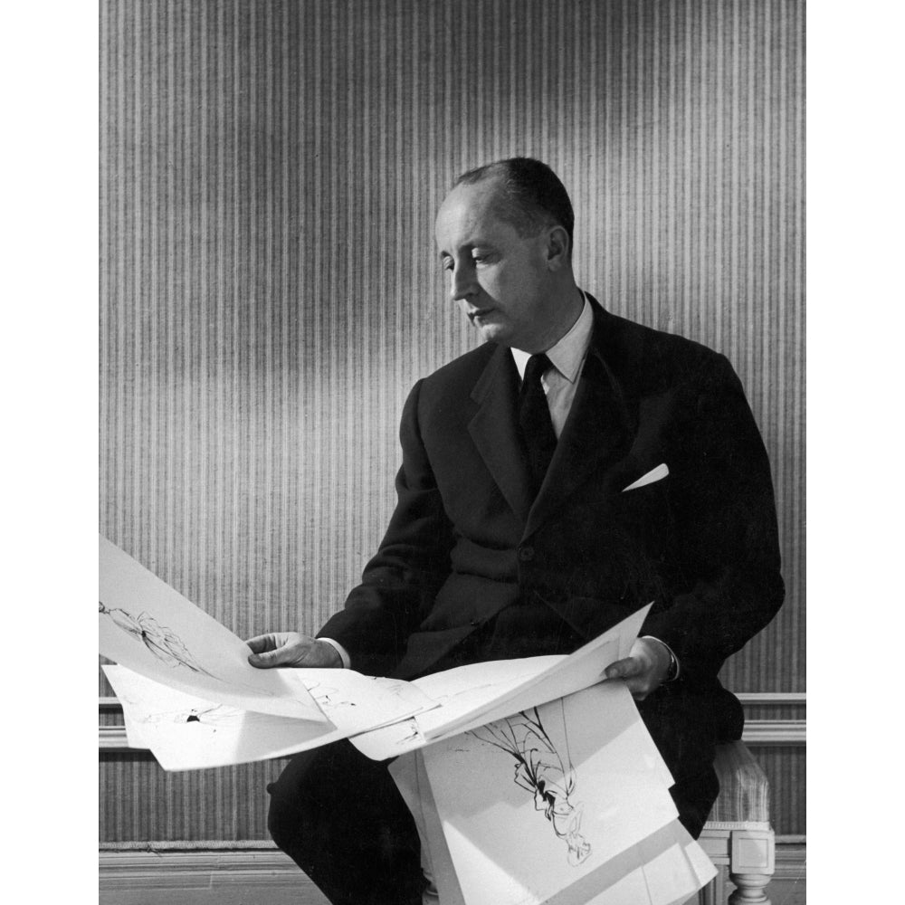 Christian Dior . Nfrench Fashion Designer. Dior Looking Over Some Of His Sketches For WomenS Dresses 1940S Image 2