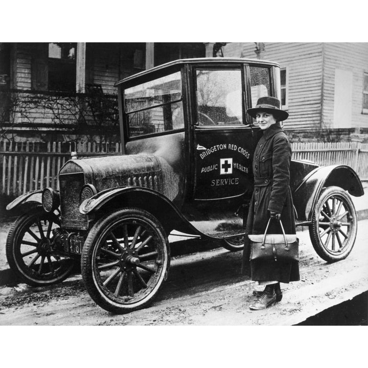 Red Cross Nurse and Car 1916. Na Red Cross Nurse With A Model T Ford In Bridgeton Massachusetts. Photograph 1916. Image 1