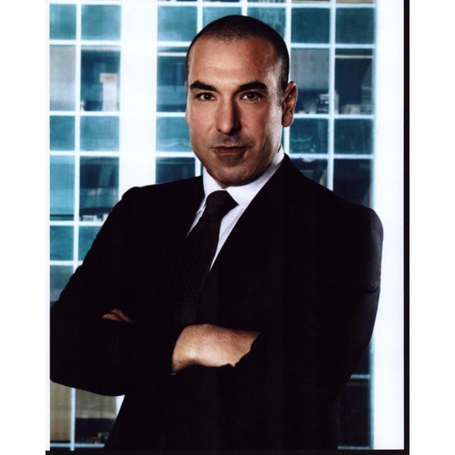 Rick Hoffman In Black Suit Blue Tile Background Photo Print - Item MVM01870 Image 1