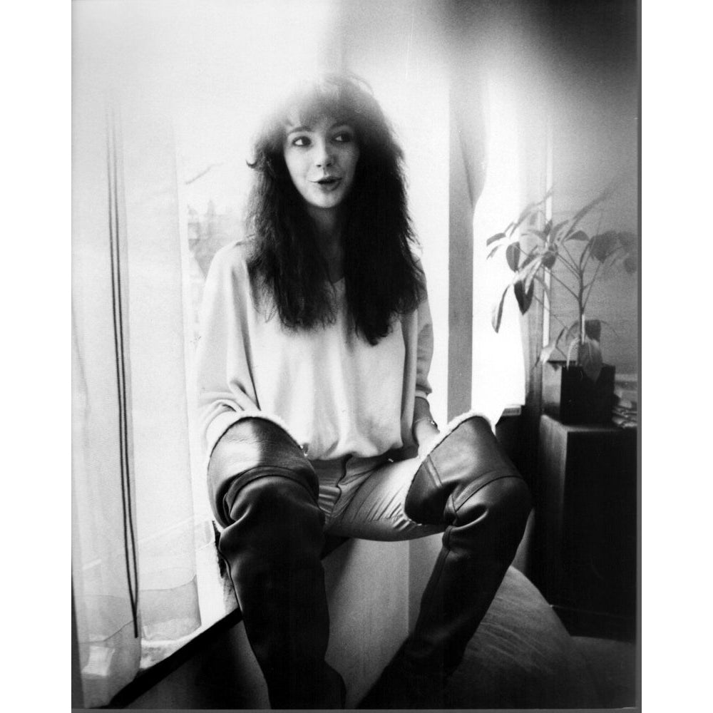 Kate Bush Sitting On Windowsill In Leather Boots Photo Print - Item MVM02677 Image 1