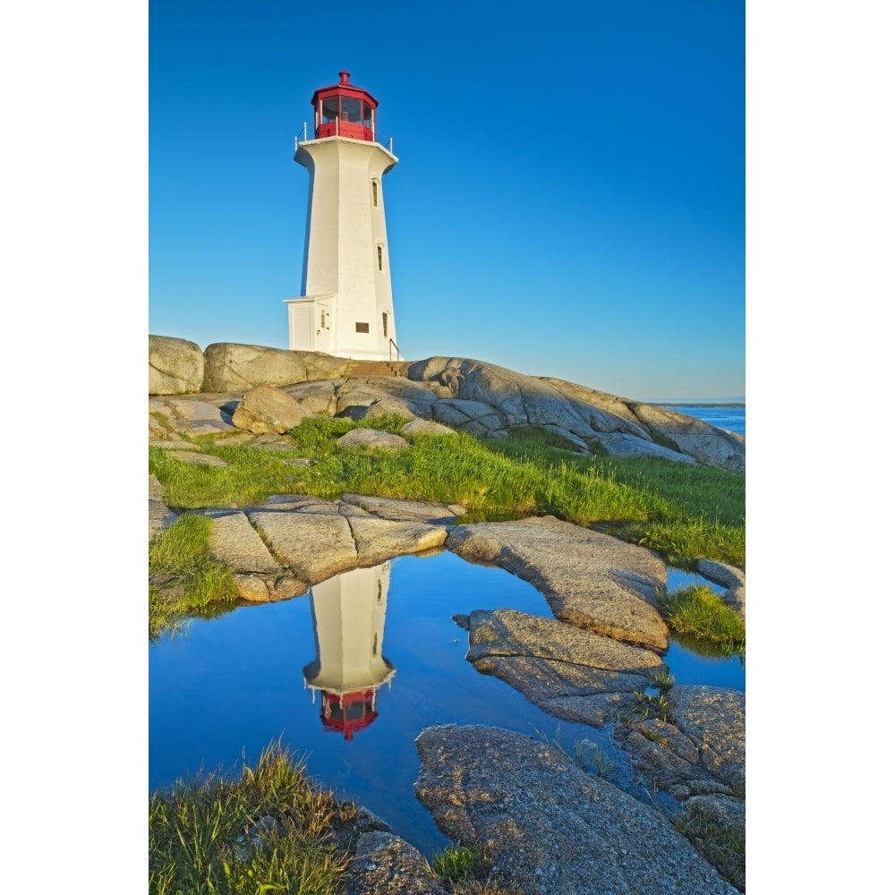 Canada Nova Scotia. Peggys Cove Lighthouse reflection in water. Poster Print by Jaynes Gallery Image 1