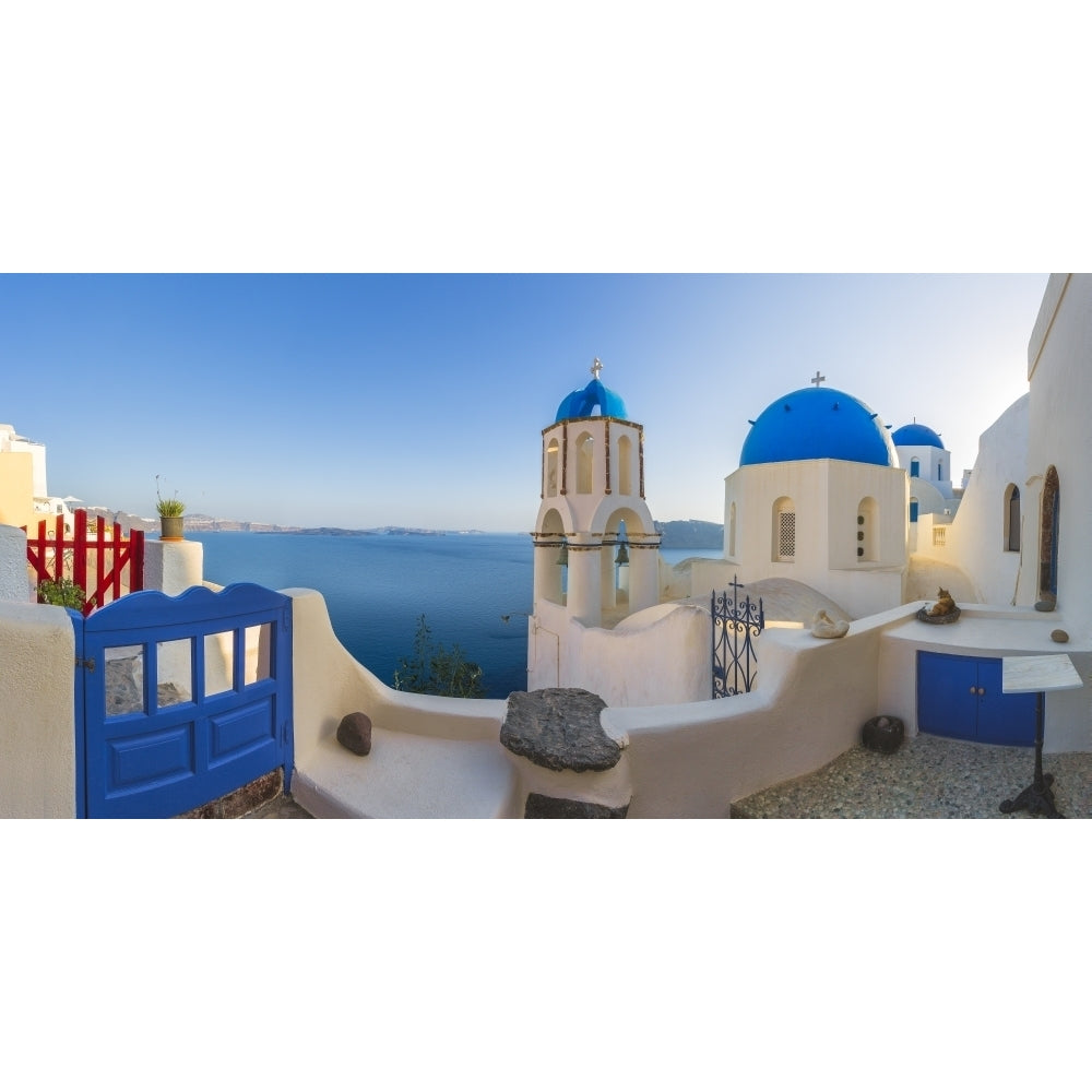 Greece Oia. Sunrise on Greek Orthodox church and village. Poster Print by Jaynes Gallery Image 1