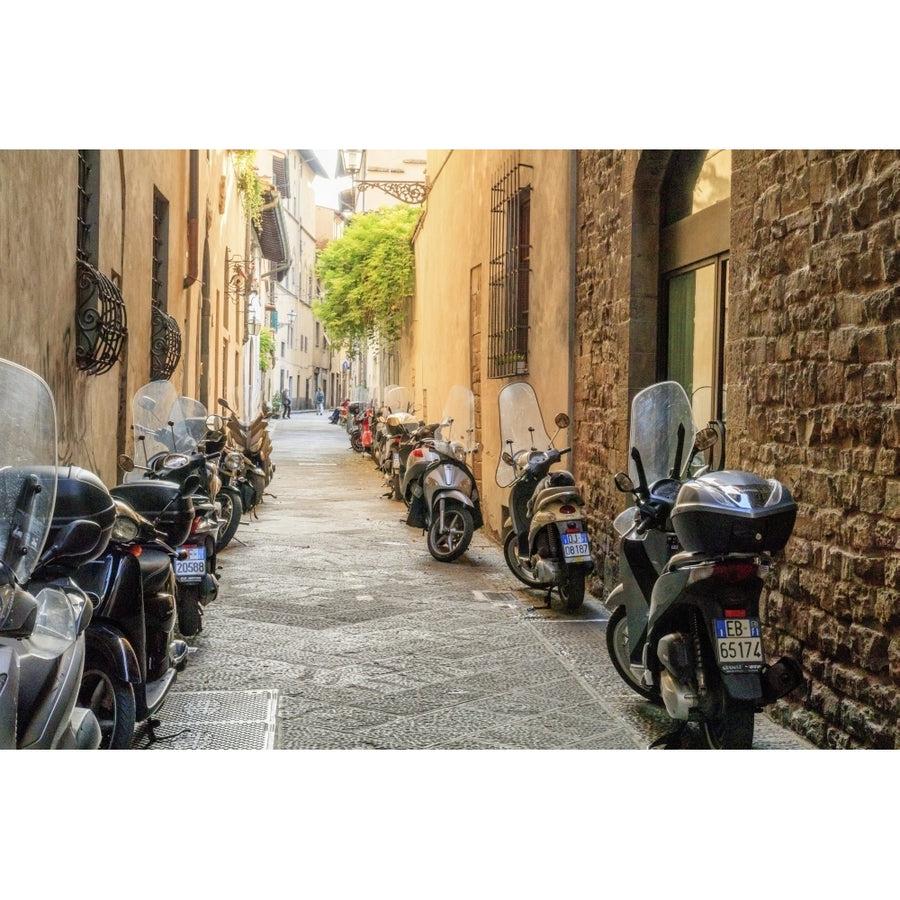 Italy Florence. Deteriorating stone wall and colorful mopeds and motor bikes. Poster Print by Emily Wilson Image 1