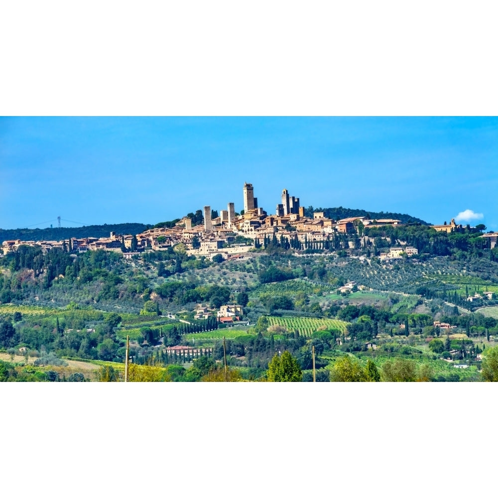 Medieval town of San Gimignano Tuscany Italy. Vineyards fields and hill town. Poster Print by William Perry Image 1