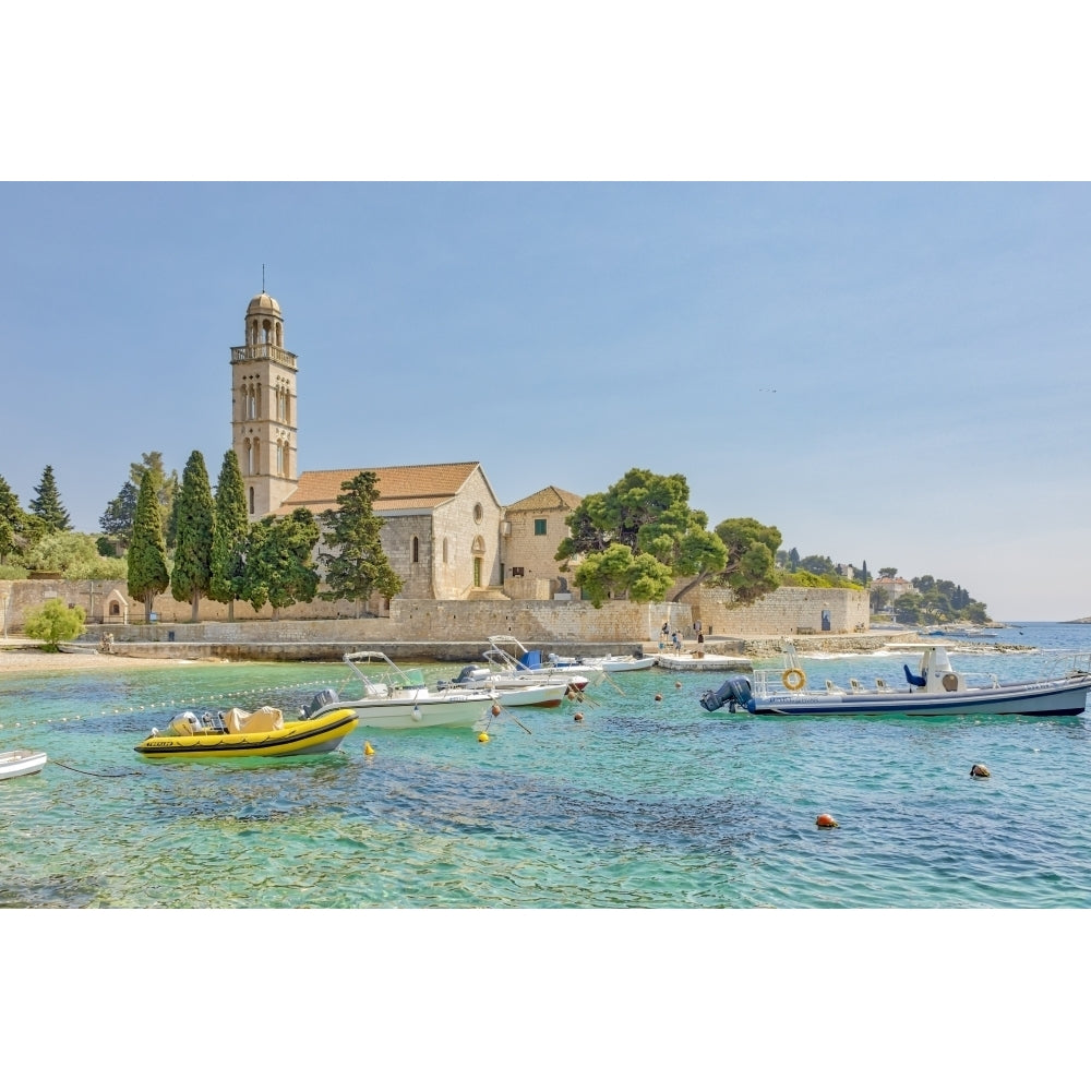 Croatia Hvar. Franciscan monastery and boats in harbor. Poster Print by Jaynes Gallery Image 1