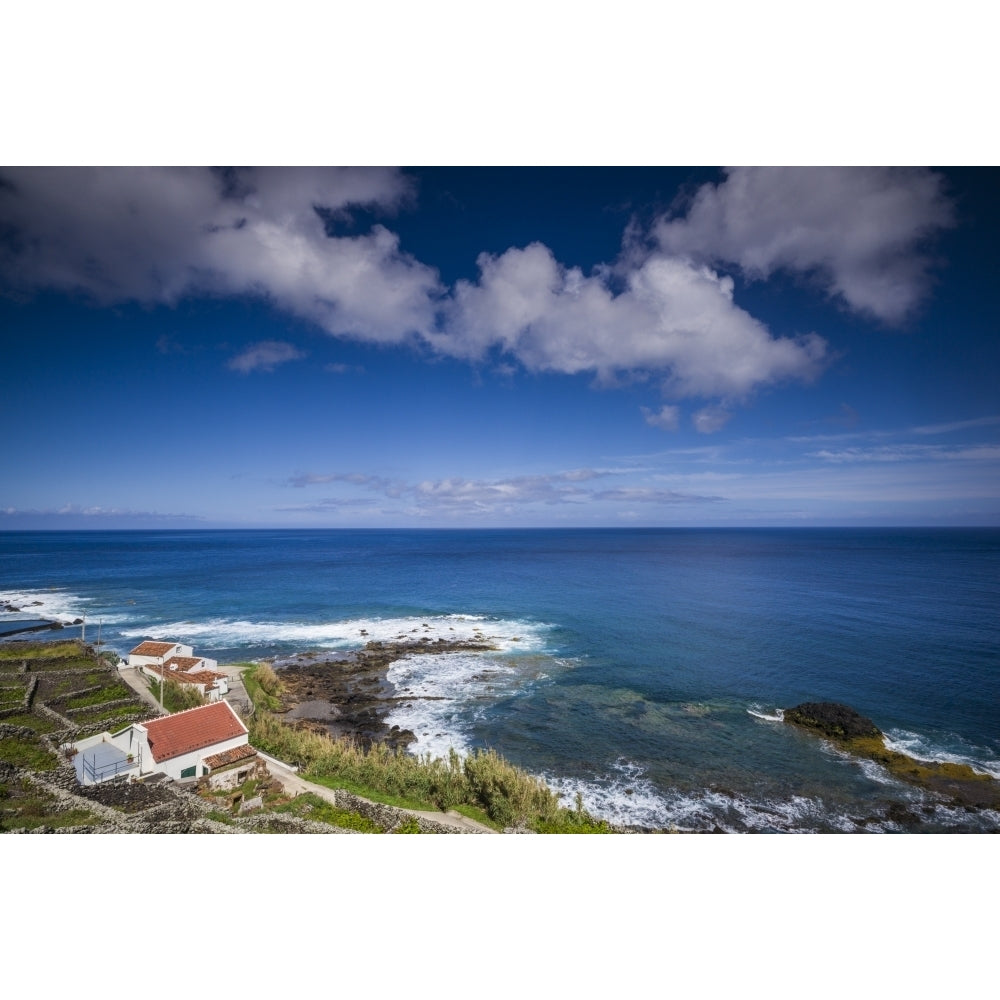 Portugal Azores Santa Maria Island Maia. Elevated view of town and volcanic rock vineyards Poster Print by Walter Image 1