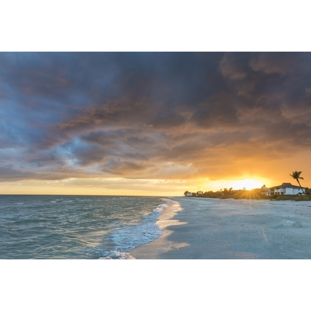 Sunset clouds over the Gulf of Mexico on Sanibel Island in Florida USA Poster Print by Chuck Haney Image 1