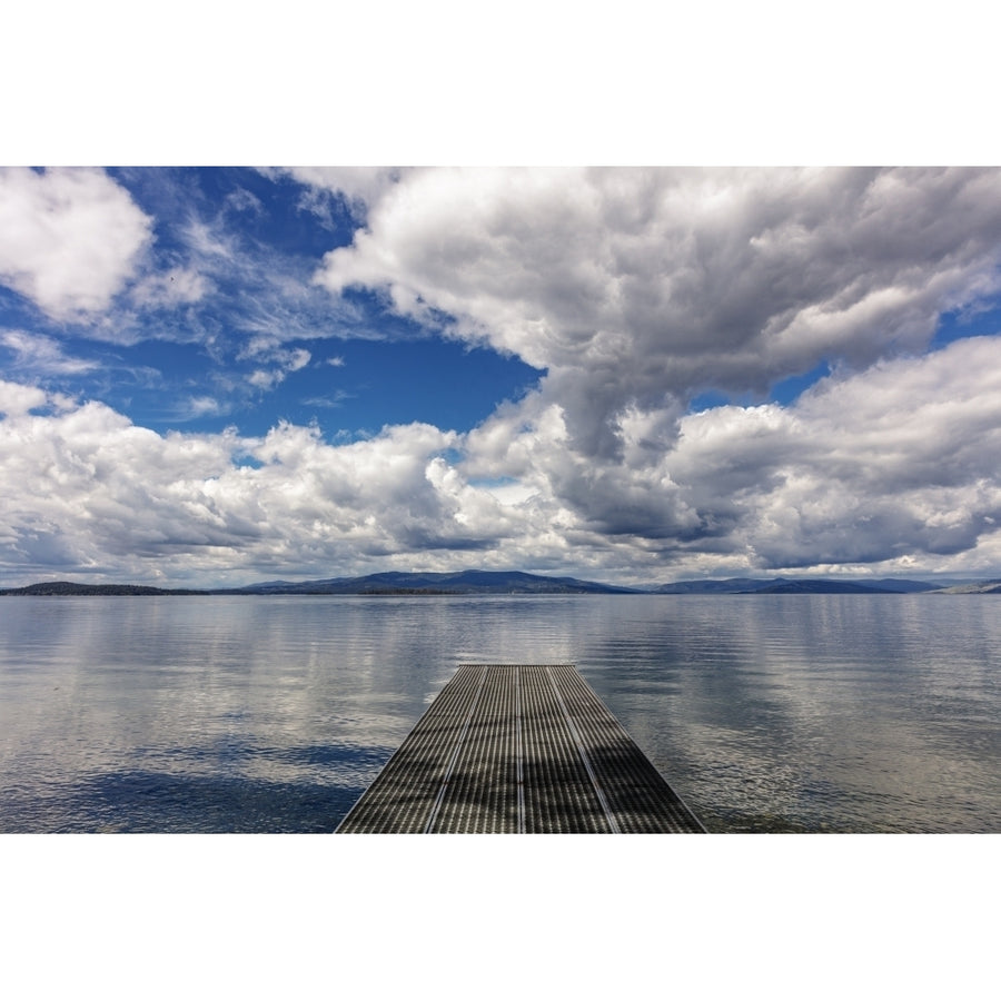 Dock reaches out into Skidoo Bay in Flathead Lake near Polson Montana USA Poster Print by Chuck Haney Image 1