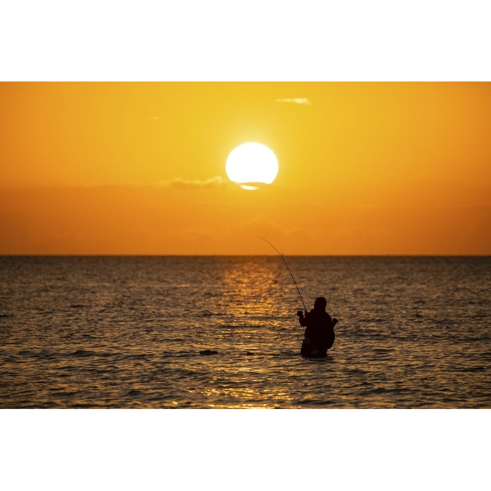 Saltwater fishing in Laguna Madre at sunrise. Poster Print by Larry Ditto Image 1