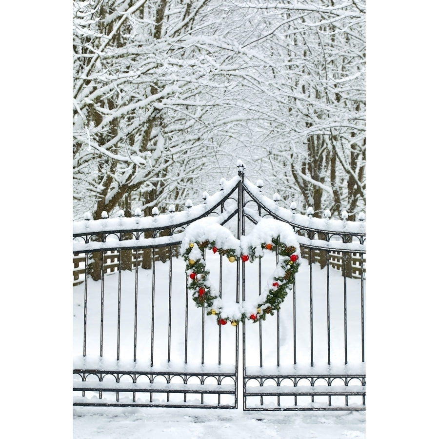 Fence line and fresh snow with trees line lane and metal gate with Christmas wreath. Poster Print by Darrell Gulin Image 1