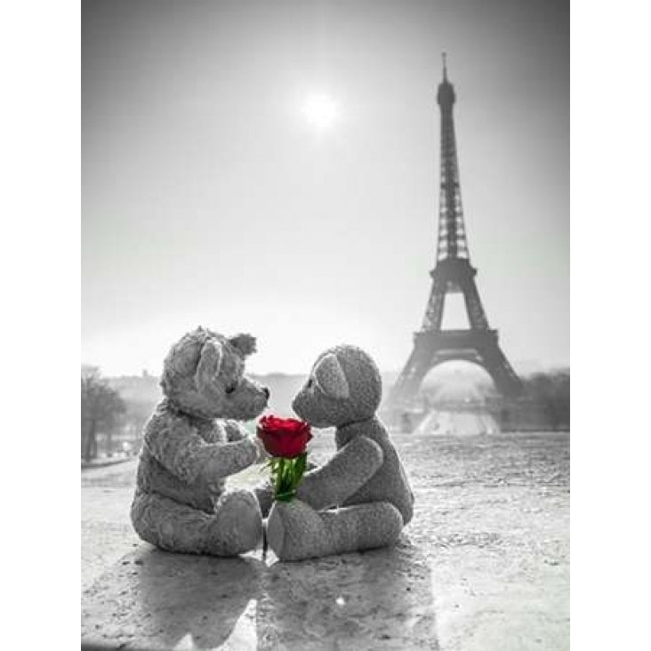 Two Teddy bears with a rose next to the Eiffel tower Poster Print by Assaf Frank Image 1