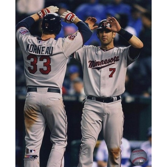 Joe Mauer and Justin Morneau 2010 Action Sports Photo Image 1