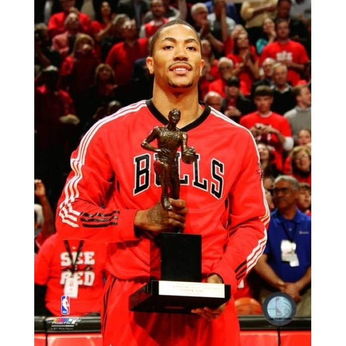 Derrick Rose poses with the 2010-11 NBA MVP Trophy Photo Print Image 1