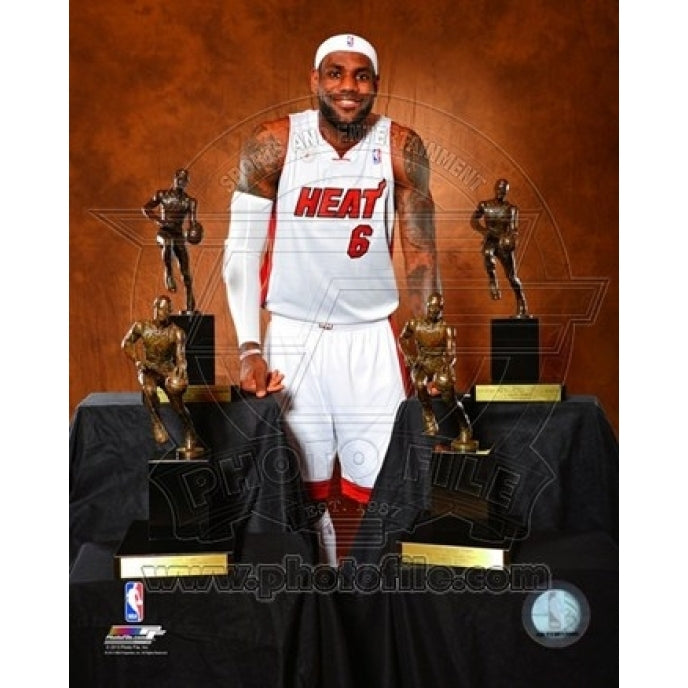 LeBron James poses with his four MVP Trophies Sports Photo Image 1