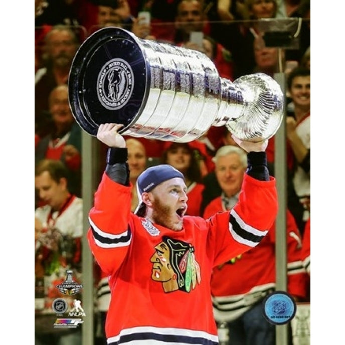 Patrick Kane with the Stanley Cup Game 6 of the 2015 Stanley Cup Finals Sports Photo Image 1