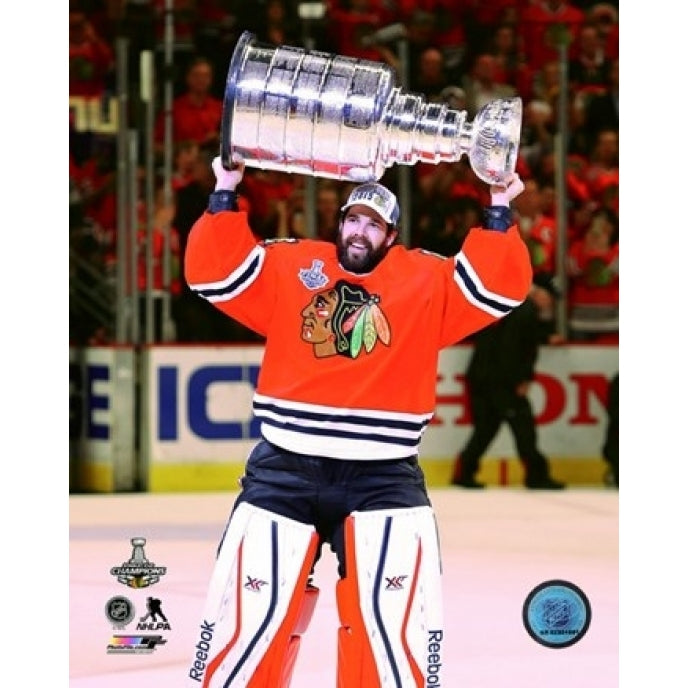 Corey Crawford with the Stanley Cup Game 6 of the 2015 Stanley Cup Finals Sports Photo Image 1