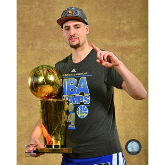 Klay Thompson with the NBA Championship Trophy Game 6 of the 2015 NBA Finals Sports Photo Image 1