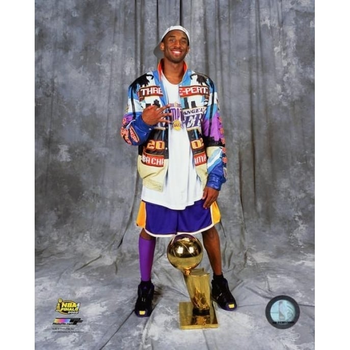 Kobe Bryant with the NBA Championship Trophy after winning Game 4 of the 2002 NBA Finals Photo Print - Item Image 1