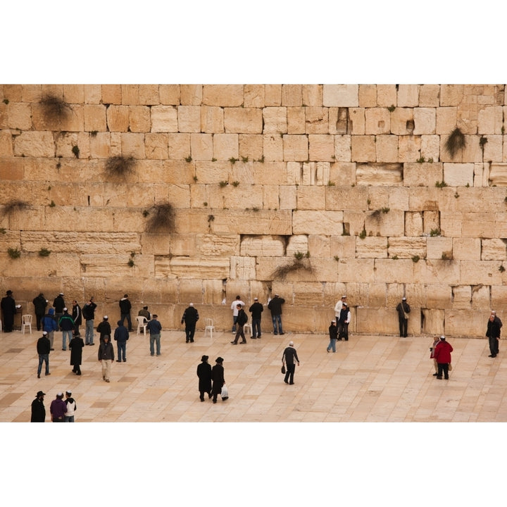 Elevated view of the Western Wall Plaza with people praying at the wailing wall Jewish Quarter Old City Jerusalem Image 1