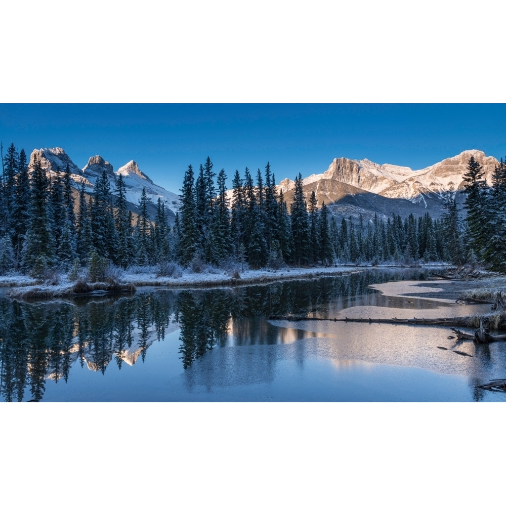 Snowy pond with mountains in background Mount Lawrence Grassi Three Sisters Bow Image 1