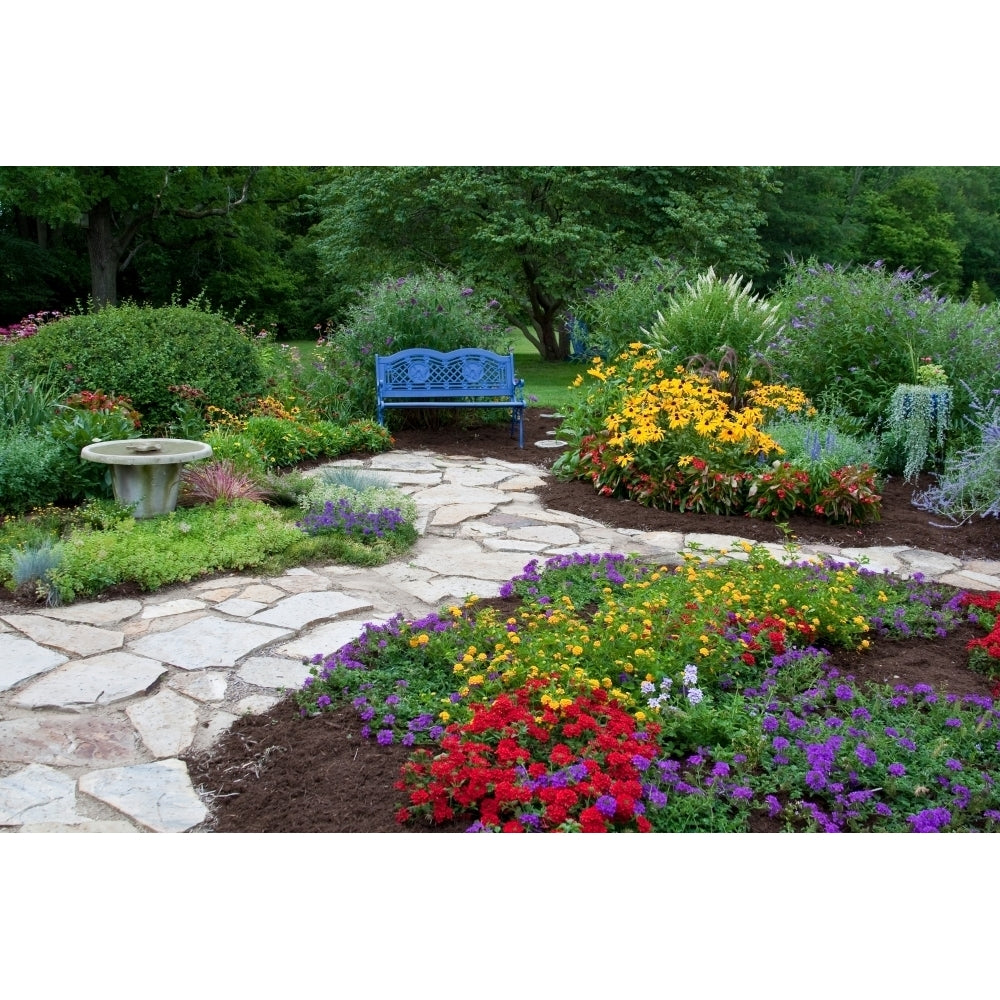 Blue bench birdbath and stone path in a flower garden Marion County Illinois USA Poster Print Image 1