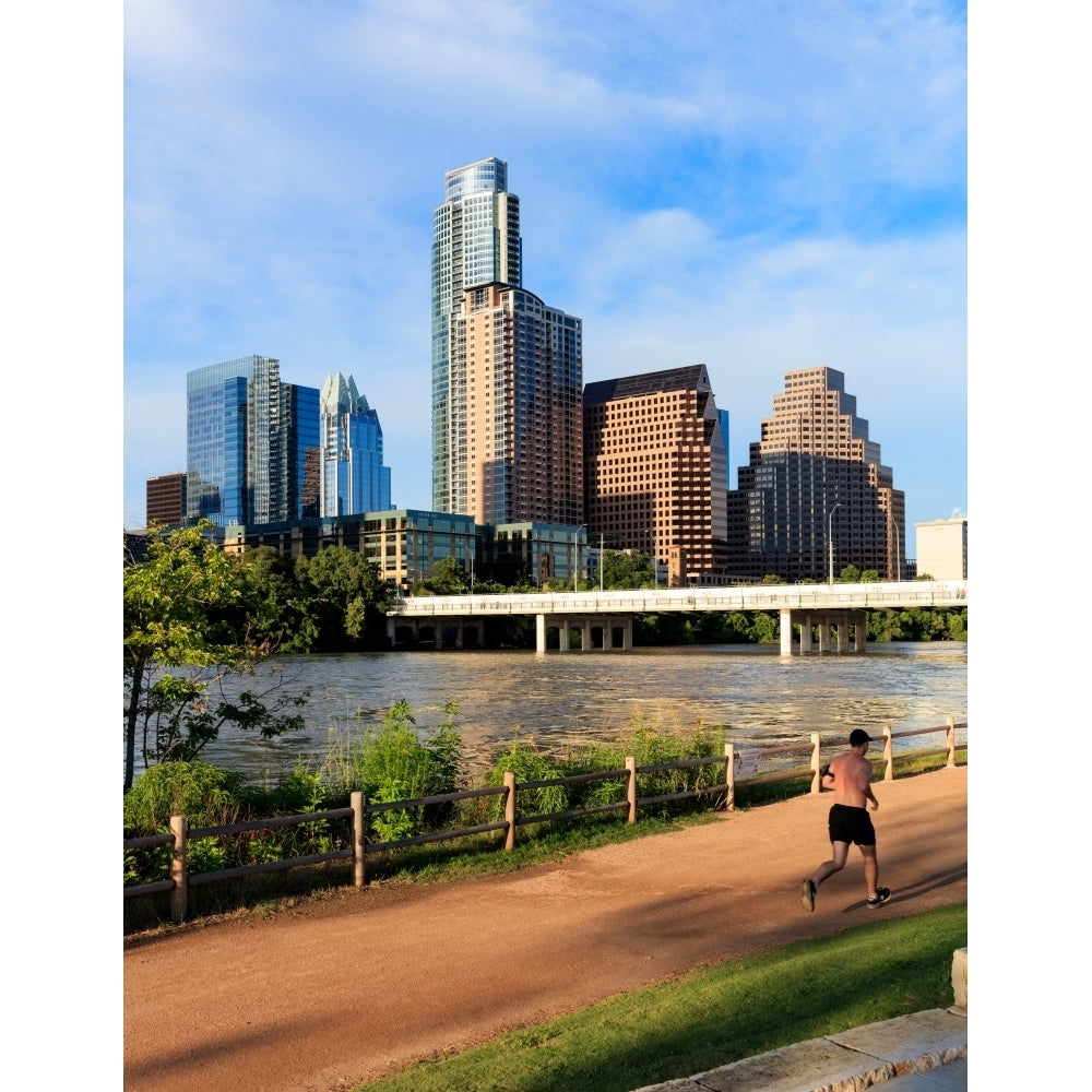 Runner on path along south shore of Lady Bird Lake in downtown Austin Texas USA Poster Print Image 1