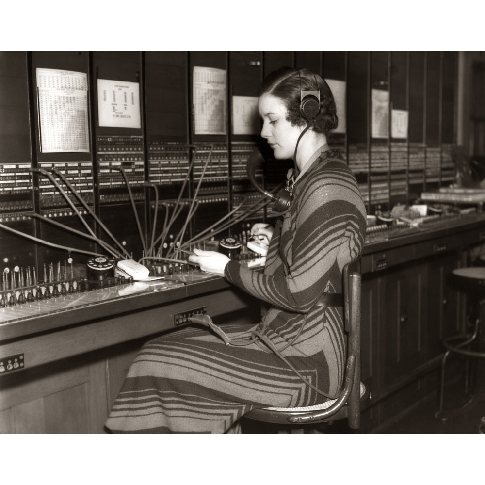 1930s Woman Telephone Operator Sitting At Large Manual Switchboard Directing Calls Print By Vintage Collection Image 1