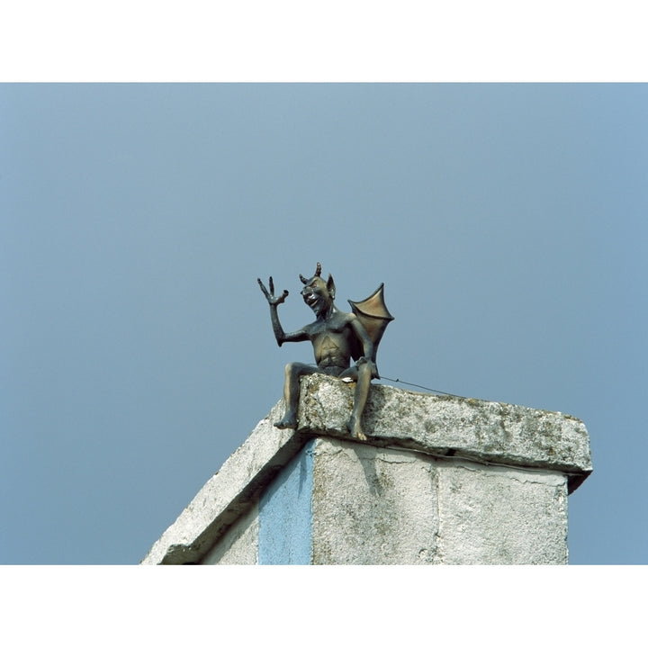 Low angle view of dragon weather vane on chimney Poster Print by Panoramic Images Image 2