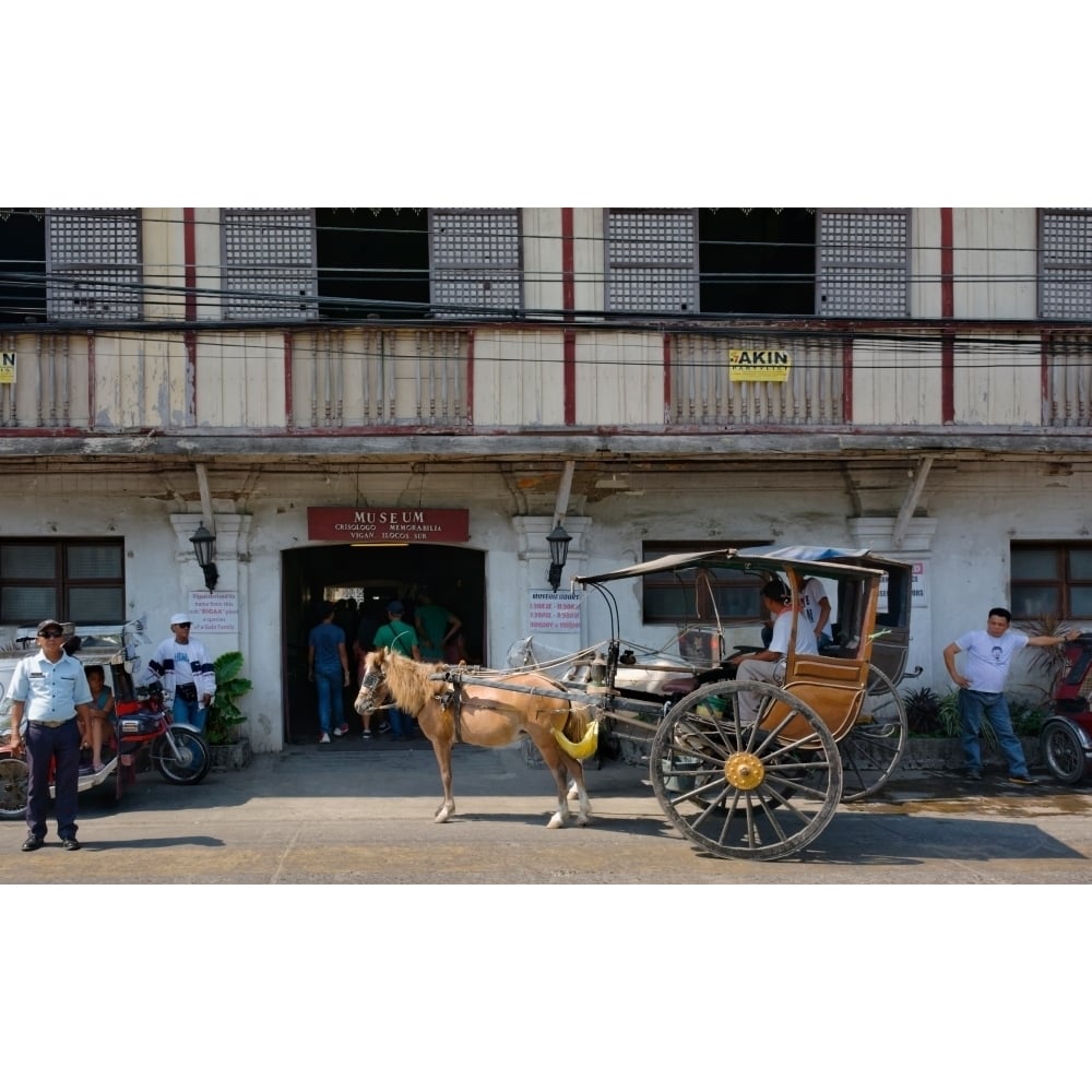 Horsedrawn and people outside a museum Crisologo Museum Vigan Ilocos Sur Philippines Print by Panoramic Images Image 1