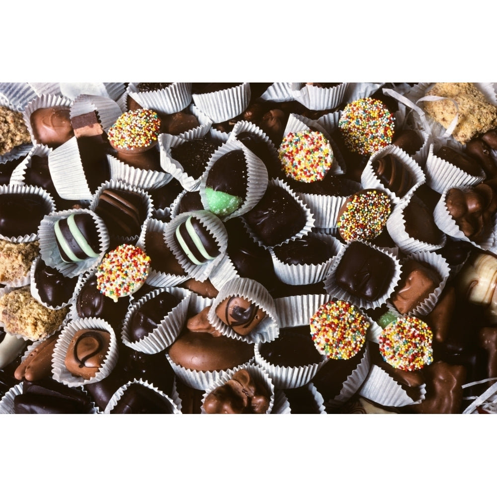 Chocolate Candies In White Paper Cups All In A Pile Some With Sprinkles Poster Print By Vintage Collection Image 1