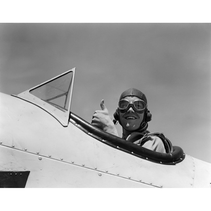 1940s Smiling Army Air Corps Pilot In Open Cockpit Wearing A Leather Flying Helmet Giving A Thumbs-Up Sign Print By Image 1