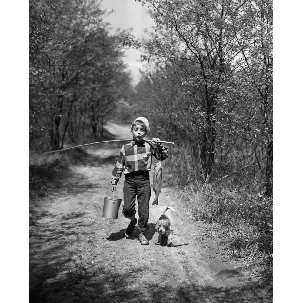 1950s Boy With Beagle Puppy Walking Down Country Road Whistling Carrying Fishing Pole Pail And Fish Print By Vintage Image 1