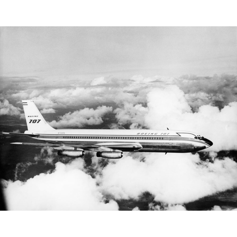 1950s Boeing 707 Passenger Jet Flying Through Clouds Poster Print By Vintage Collection Image 1