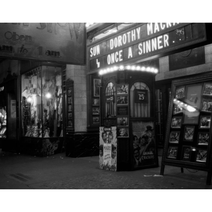 1930s York City 8Th Avenue And 58Th Street The Columbus Neighborhood Movie House Marquee And Ticket Booth At Night Image 1