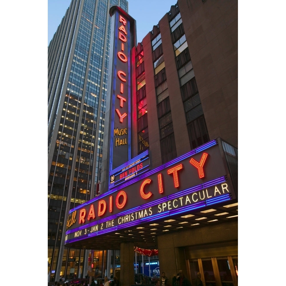 Neon lights of Radio City Music Hall at Rockefeller Center York City York Print by Panoramic Images Image 1