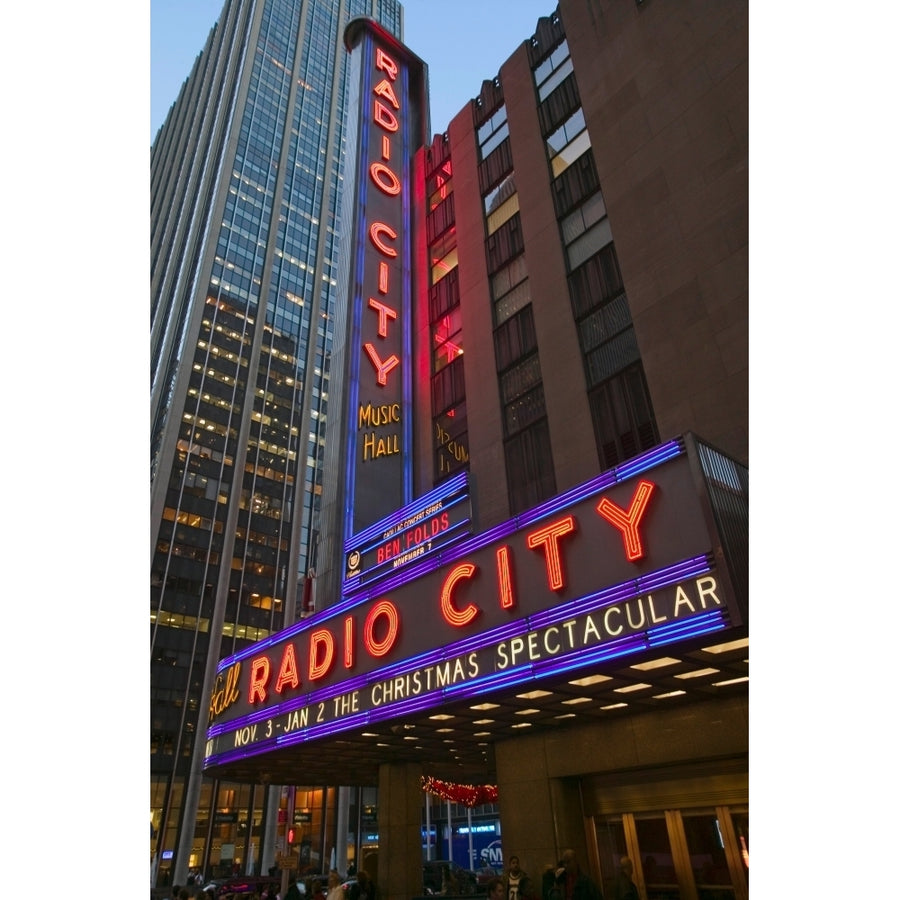 Neon lights of Radio City Music Hall at Rockefeller Center York City York Print by Panoramic Images Image 1