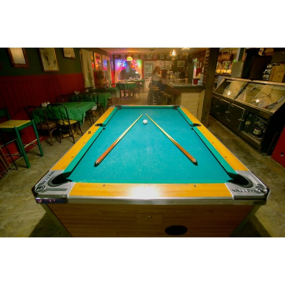 Pool table lit by electric lights in a restaurant and bar in Shoshone CA near Death Valley National Park Print by Image 1